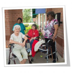 Elderly people in front of building